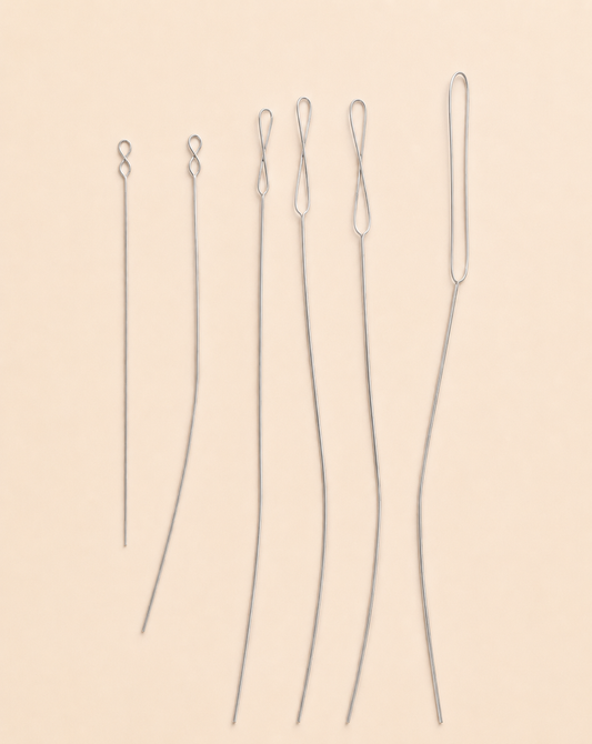 Lot de 7 aiguilles à perles.
